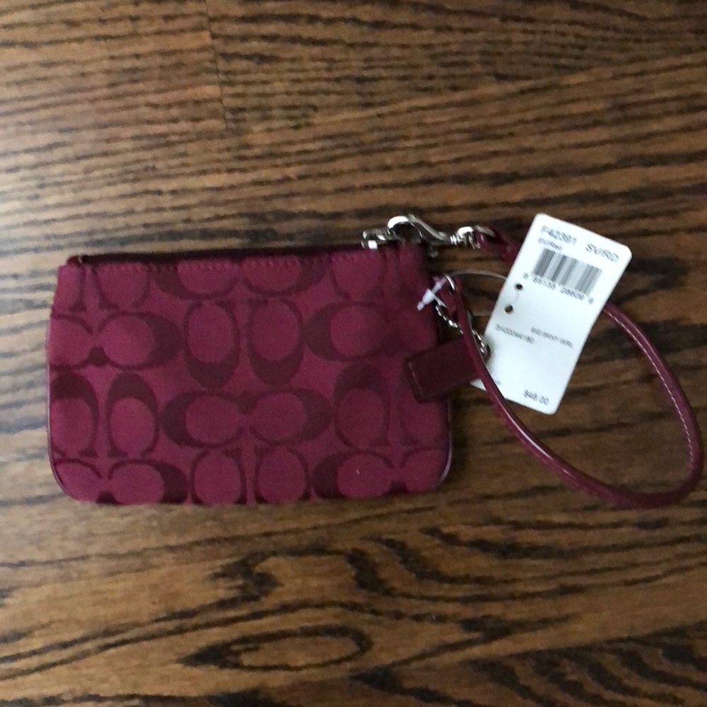 Purple coach wristlet